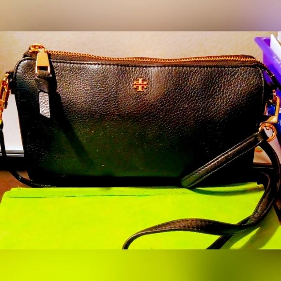 Tory Burch Black Leather Cross body Purse with brass buckle adjustable strap. - Picture 9 of 16